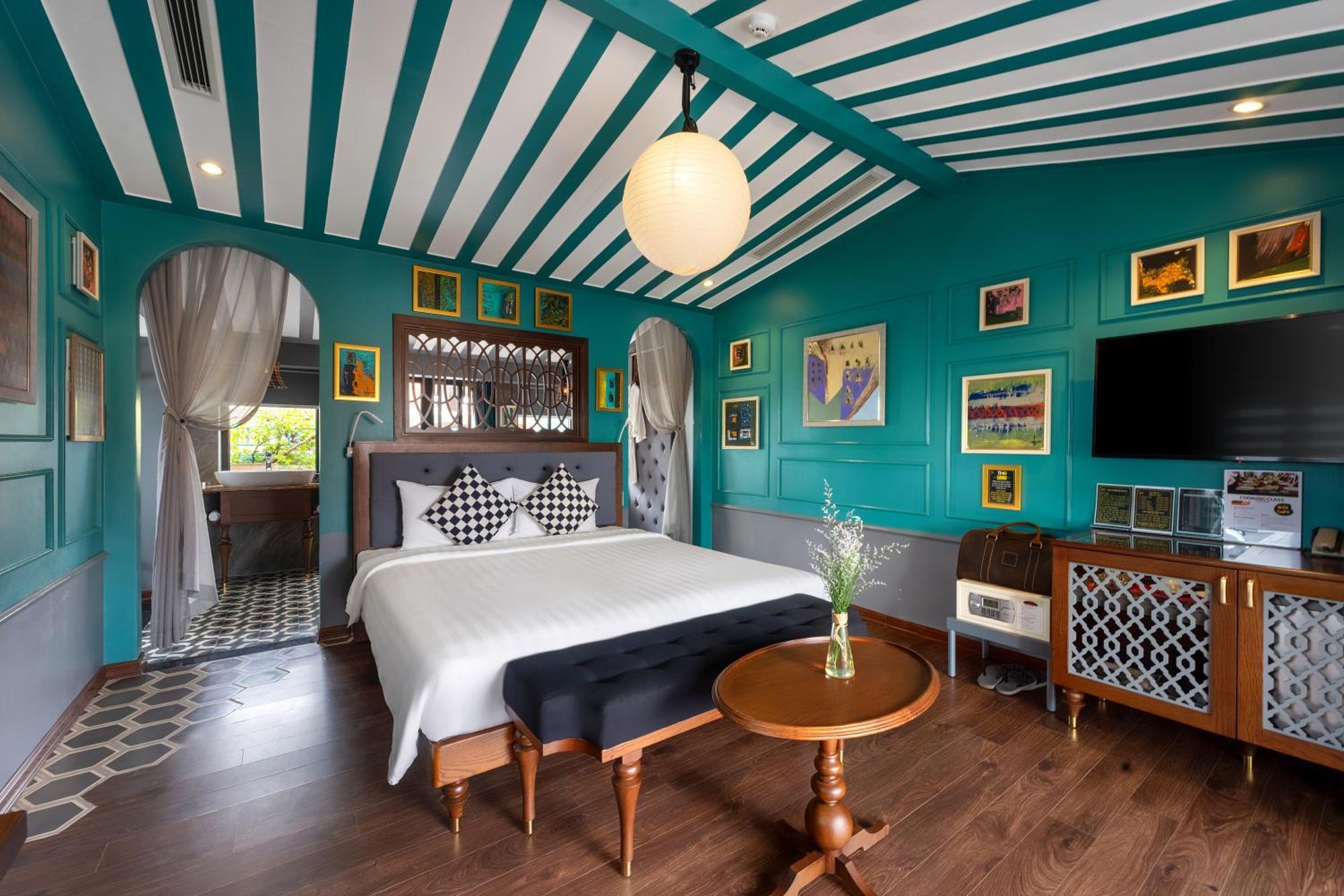 Son Hoi An Boutique Hotel & Spa Exterior foto A bedroom at the hotel